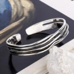 Side view showing the lightweight 20 g construction of the silver cuff