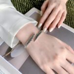 Silver Feather Cuff Bracelet – Trendy Retro Thai Design - Image 2